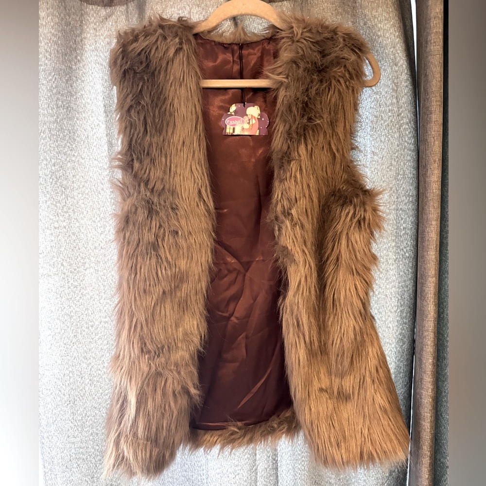 Long-haired faux fur brown vest. NWT.